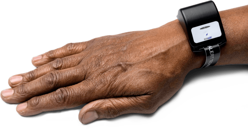 Hand with Neuralert Device on wrist