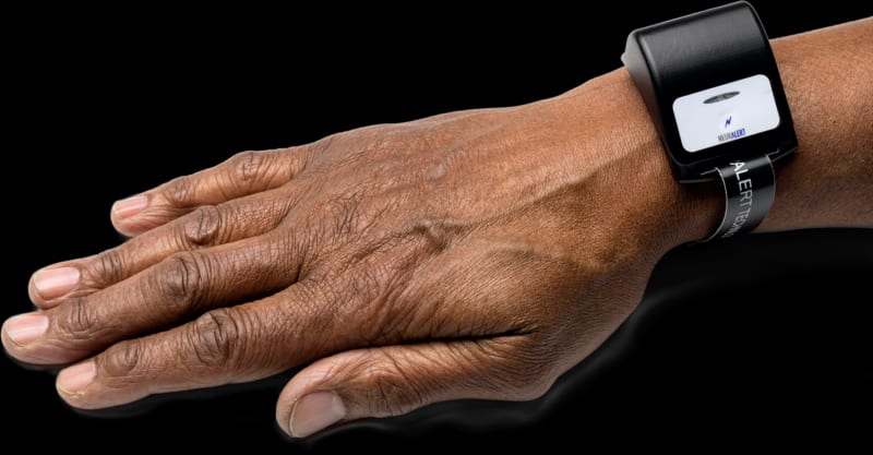 Hand with Neuralert Device on wrist